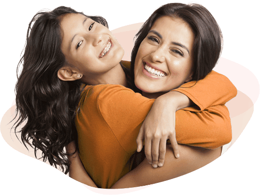 Orthodontics Daughter with Braces Hugging Mother
